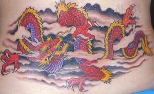 Red Color Dragon Tattoo On Lowerback